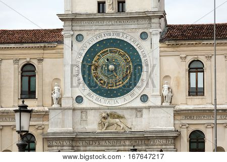 Clock tower building of medieval origins overlooking Piazza dei Signori in Padova Italy