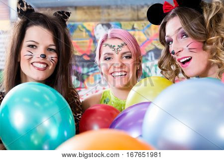 Young German women at fasching carnival having costume party