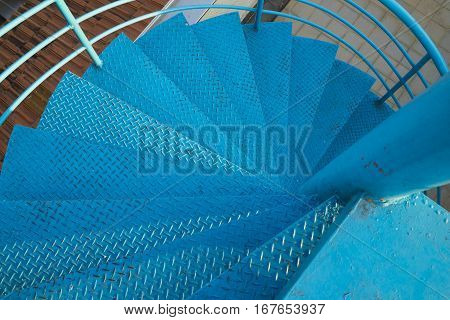 Spiral Stair Of Footbridge With The Sun Ray Light And Shadow In Daytime