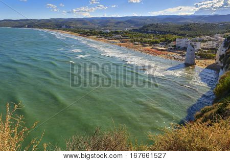Gargano coast: bay of Vieste,(Apulia) ITALY.Castello or Scialara beach:it is overshadowed by the Swabiam Castle and the Pizzomunno Monolith (from the local dialect: peak of cape of the world).