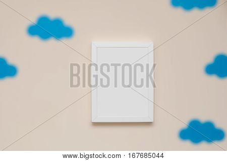 empty picture frame on a bedroom wall to add your own photograph or art