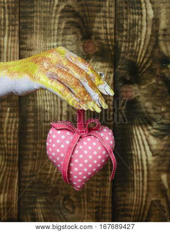 Female Hand Holding Valentine Heart