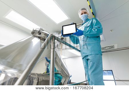 Plant Picture, Scientist Is Showing Empty Tablet Near Barrel