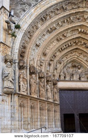 Entrance of the gothic cathedral of Santa Maria in Castello d Empuries Girona province Catalonia Spain