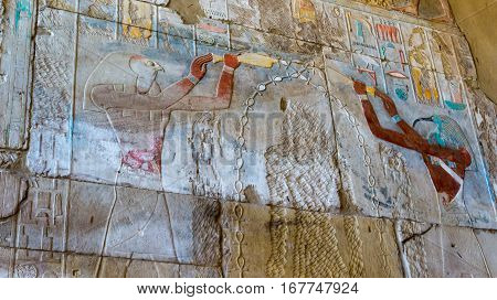Egyptian ancient temple engravings on the wall
