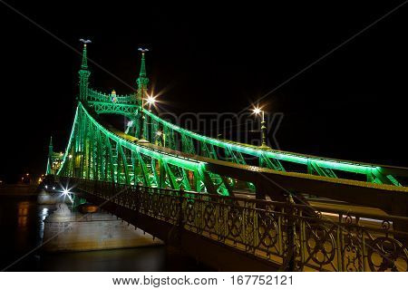 Western side of Liberty Bridge connecting Buda and Pest across the Dunabe River in Budapest Hungary