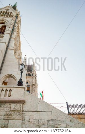 National Flags On Hungarian Parliament Building Located At The Bank Of Dunabe River In Budapest, Hun