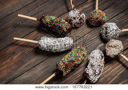 Chocobanana - traditional dessert in Guatemala of frozen banana dipped into hot chocolate.