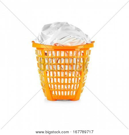 Clothes in  basket on white background