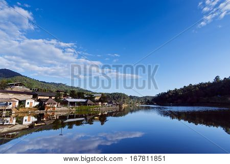 Ban Ruk Thai village chinese style riverside view in front of the mountain Mae Hong Son Thailand with blank copy text space