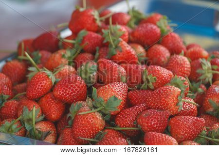 Fresh organic strawberries in Thai market, street food