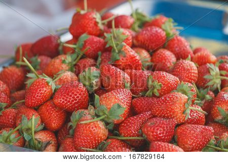 Fresh organic strawberries in Thai market, street food