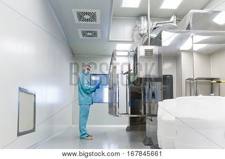 Scientist Stand Near Control Panel