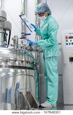 Plant Picture, Scientist Standing With Tablet