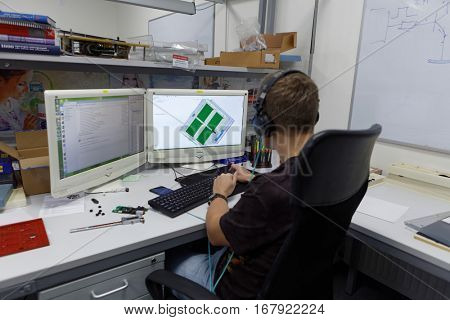 ST. PETERSBURG, RUSSIA - NOVEMBER 2, 2016: People at work in the development department of StarLine company. It is one of the leading company on the automotive security market of Russia
