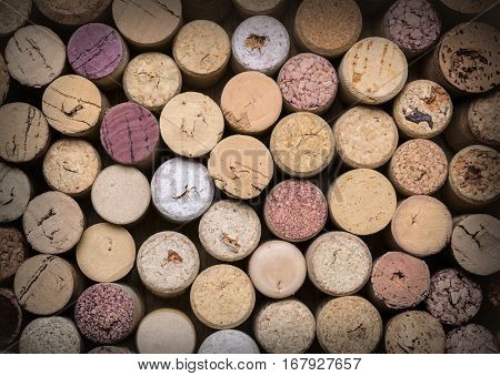 wine corks on wooden table bakground textute