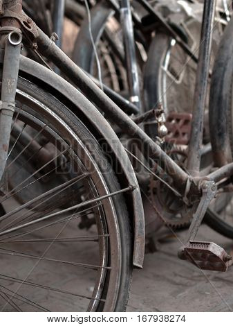 ABSTRACT SHOT OF OLD RUSTY BICYCLE PARTS