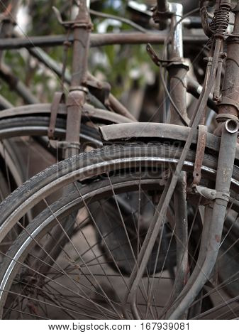 ABSTRACT SHOT OF OLD RUSTY BICYCLE PARTS