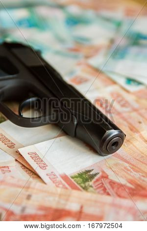 Black Gun Lies On The Russian Big Money