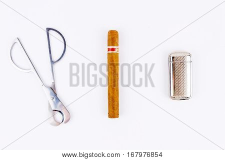 Object Photography Of A Cigar,a  Lighter And A Cutter