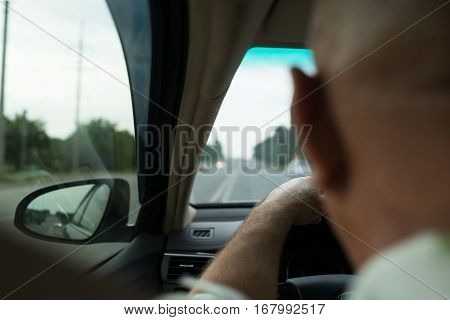 The driver is driving on the highway