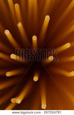 A Bouquet Of Spaghetti On A Dark Background Near