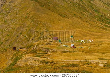 Tourist Camp On The Autumn Mountain Plateau On The Psekhako Ridge