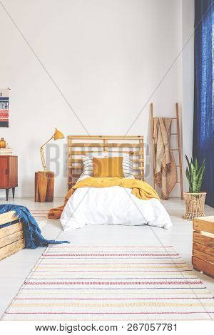 Bright Oldschool Teenager Bedroom With Vintage Furniture, Real Photo With Copy Space On The Wall