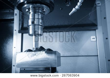 The  Cnc Milling Machine Cutting The Mold Part With The Index-able Radius End Mill Tool In Roughing 