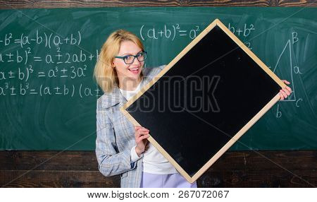 Teacher Show School Information. Remember This Information. Teacher Smart Smiling Woman Hold Blackbo
