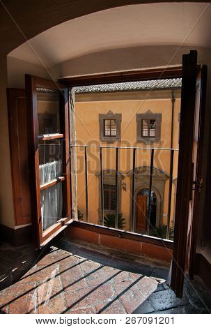 View From A Castle Window:  Light Streams Onto A Stonework Floor Through A Window Overlooking The Co