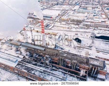 Aerial Top View Clouds Of Smoke And Steam Cooling Tower Industrial Heat Electro Central Coal. Enviro
