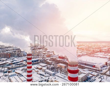 Aerial Top View Clouds Of Smoke And Steam Cooling Tower Industrial Heat Electro Central Coal. Enviro