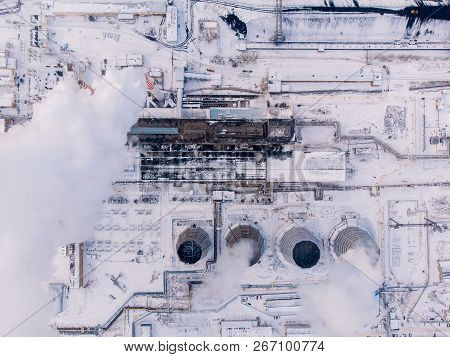 Aerial Top View Clouds Of Smoke And Steam Cooling Tower Industrial Heat Electro Central Coal. Enviro