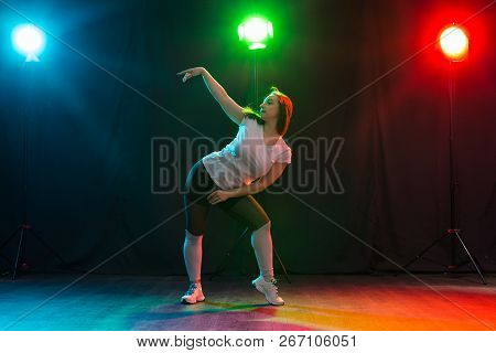 Hip-hop, Jazz-funk, Tecktonik, Waacking, Trance And Street Dances Concept - Young Woman Dancing Jazz