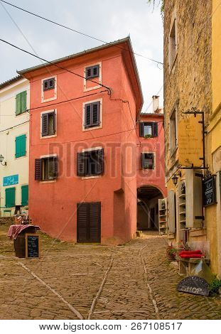 Oprtalj, Croatia - August 31st 2018. A Local Wine Gift Shop Awaits Tourists In A Square In The Histo