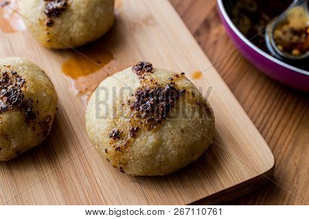 Icli Kofte / Boiled Kibbeh / Quibe With Butter Sauce.