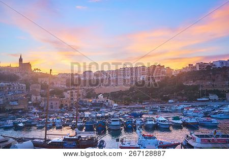 Ghajnsielem, Malta - June 15, 2018: The Upper Deck Of The Ferry Is Best Place To Watch The Sunset Ov