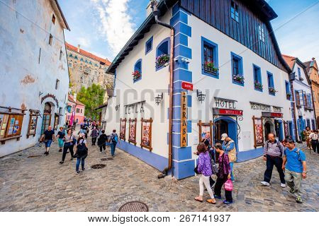 Krumlov, Czech Republic - 21 September 2018: View of Cesky Krumlov narrow street with beautiful ancient arcitecture and tourists