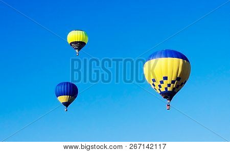 Air balloon on the blue sky background
