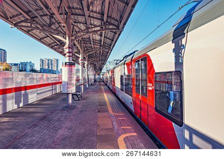 Moscow, Russia - October 11, 2018: Train Stands By The Platform Of Shelepicha Railway Station. Mosco