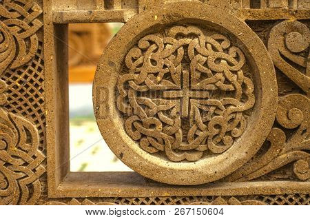 Oshakan,armenia,19 Februar,2018: Relief Ornament On A Red Volcanic Stone, Carved From Intersecting S