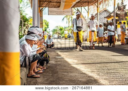 Bali, Indonesia - October 9, 2018: Balinese Boy In Traditional Clothes On Culture Ceremony, Ubud, Gi