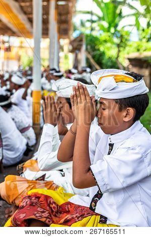 Bali, Indonesia - October 9, 2018: Balinese Boy In Traditional Clothes On Culture Ceremony, Ubud, Gi