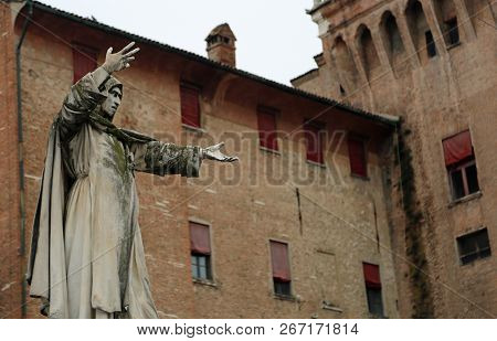 Big Statue Of Savonarola Girolamo In Ferrara In Italy And The Castle On Background