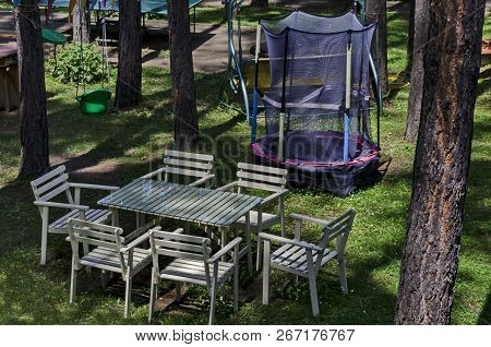 Lozen Mountain, Bulgaria - June 11, 2018: Summer Child Public Bivouac  With Table, Chair And  Jumpin