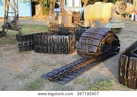 Track New Combine. Parts Of Agricultural Machinery. Track Prepared For Mounting On The Harvester.