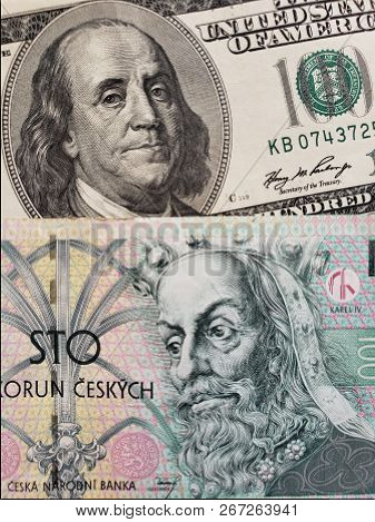 Approach To Czech Banknote Of 100 Korun And American 100 Dollar Bill, Background And Texture