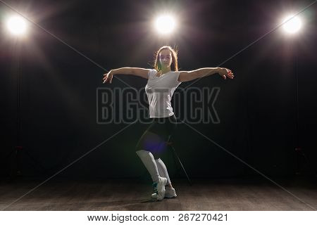 Hip-hop, Jazz-funk, Tecktonik, Waacking, Trance And Street Dances Concept - Young Woman Dancing Jazz