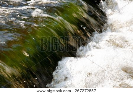 Waterfalls In Summer. Clear And Fresh Water Are Falling Down. Tints Of Green And White. Fotography M